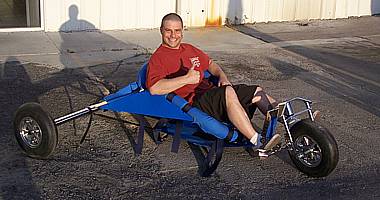 Troy very comfortably sitting in the Ivanpah Kite Buggy